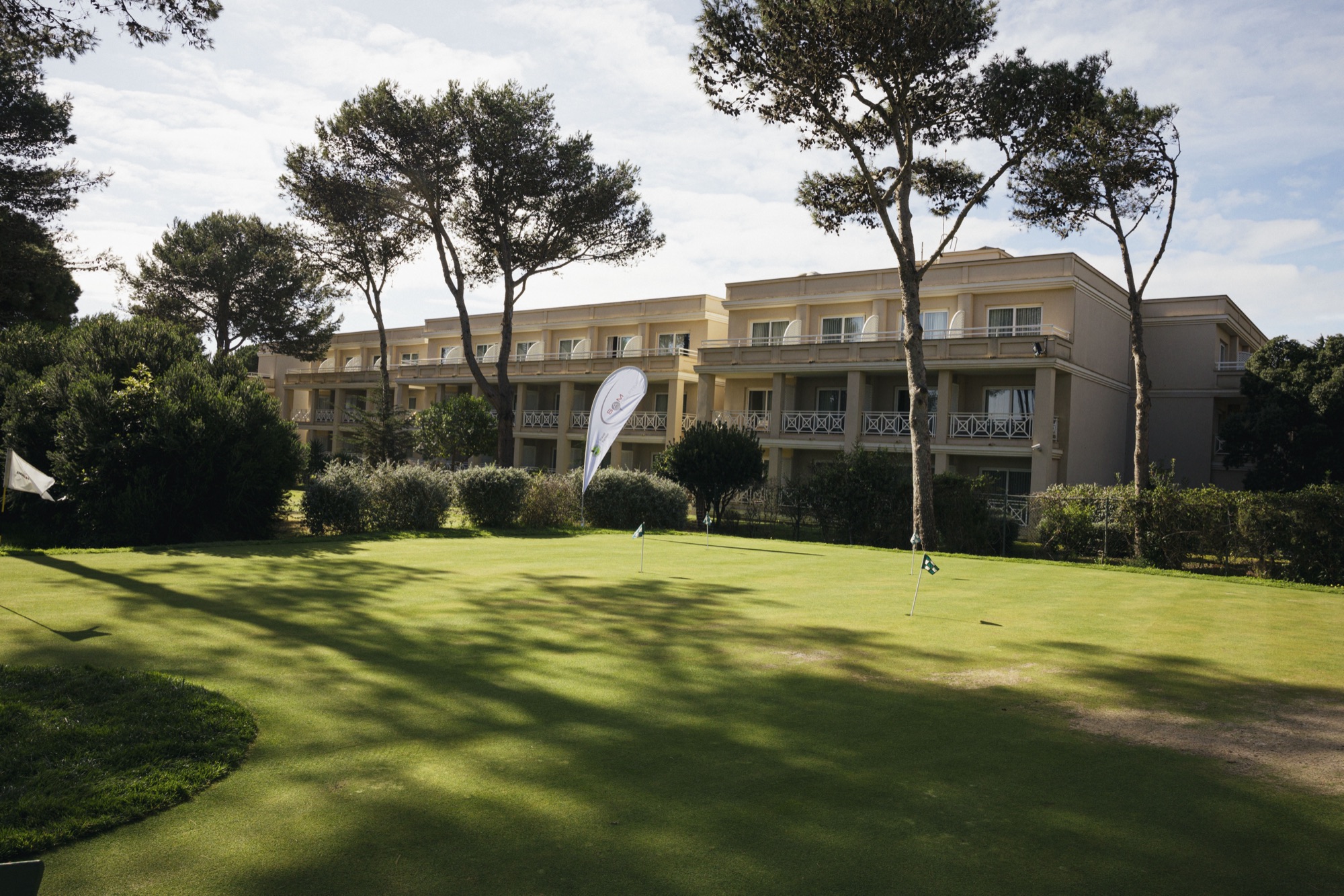 Lawn and hotel of a golf resort on the Portuguese coast